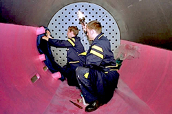 Workers install rubber molding at a Gumiimpex’s factory in Varaždin, Croatia.