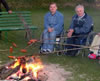 A group of physically impaired grills sausages