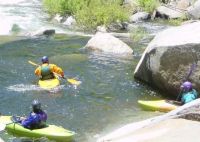 Photo of kayakers on Tiger Creek near the"Take-out" of the Mokelumne River