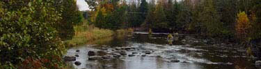 Boulders in the Plover River were transported from far away inside a glacier.