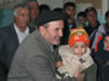 Community health festivals A father and his son enjoy the Melhem Shamakhi's final Community Health Festival of 2007