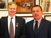 Patrick Murphy (wearing his medal of honor) stands with Yuriy Sidorenko, Chairman of the Russian Council of Judges.