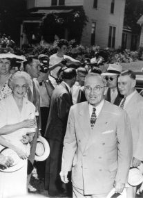 Truman with crowd in front of Truman Home.