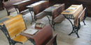 Rows of wooden pupils' desks.