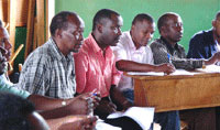 Photo of a community meeting in Tanzania.
