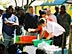 Photo of Dr. Peterson dipping a mosquito net at a demonstration.