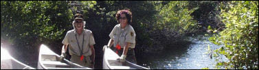 Volunteers Preparing Canoes for School Group