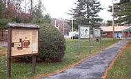 Photo of walkway and interpretive signs at North Attleboro National Fish Hatchery - Photo credit:  U.S. Fish and Wildlife Service