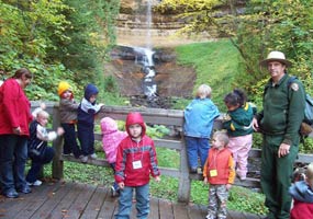 This preschool class is enjoying the short hike to Munising Falls.