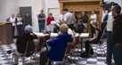 MOCK NEWS, REAL STRESS: Senior Energy Official Deborah Monette (left, next to the podium) listens to a question from a mock media reporter at the Diablo Bravo Exercise news conference near Silverdale, Wash.