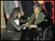 First Lady Michelle Obama greets Betty Ward, employed at the U.S. Department of Education for 68 years.