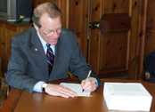 Governor Kulongoski signs bill during 2009 legislative session