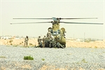 U.S. soldiers Sling Load a Howitzer