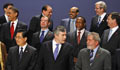 Heads of state mingling during photo session