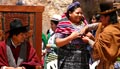 Rigoberta Menchú and other Guatemala Indians in native dress interacting