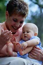 Woman interacting with a baby