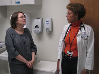 Commissioner Howard discusses patient needs with Dr. Marilyn Gordon during a tour of the Paulsboro Community Health Center (PCHC).