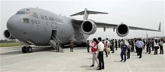 Members of the Chinese media gather around a C-17 Globemaster III from the 15th Airlift Wing at Hickam Air Force Base, Hawaii, at Chengdu Shuangliu International Airport. The United States Pacific Command support of earthquake relief efforts was authorized by Secretary of Defense Robert Gates, in support of the U.S. Department of State. (U.S. Air Force photo/Tech. Sgt. Chris Vadnais)