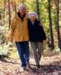 photo of an elderly couple walking