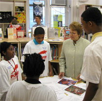 Anne-Imelda Radice,IMLS Director, with students from the Stuart-Hobson Middle School.