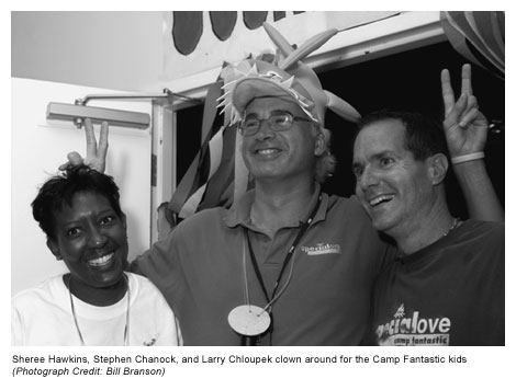 Sheree Hawkins, Stephen Chanock, and Larry Chloupek clown around for the Camp Fantastic kids