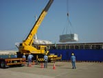 Unloading of the bus module and unit containers at Tanegashima on Wednesday, 26 Sep 2001.