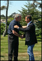 President George W. Bush greets President Nicolas Sarkozy of France upon his arrival to Walker’s Point Saturday, August 11, 2007, in Kennebunkport, Maine. White House photo by Shealah Craighead