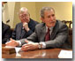 President George W. Bush meets with the President's Commission to Strengthen Social Security in the Roosevelt Room Jan. 18, 2002. Seated with the President are, from left to right, William Frenzel (far left), Mario Rodriguez, Gwendolyn King, Dr. John Cogan, Commission Co-chair Sen. Daniel Patrick Moynihan, Co-chair Richard D. Parsons and Deputy Chief of Staff Josh Bolten. White House photo by Eric Draper.