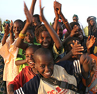 Community members in northern Senegal welcome USAID visitors. Photo by Richard Nyberg