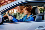 Photo: A teen learning to drive.