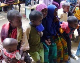 Somali children wait to be registered at UN registration center in Dagahaley refugee camp in Daadab, northern Kenya. (AP Image)