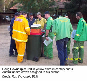 Doug Downs briefs Australian fire crews assigned to his sector