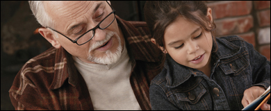 Photo: A father and daughter reading