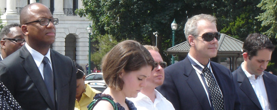 Dr. Kevin Fenton and Tom Kujawski, of NAPWA, listen to guest speakers at the National HIV Testing Day 2009 Press Conference in Washington, D.C.