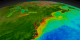 This animation begins with a wide shot of the United States and zooms down to the Northeastern seaboard of the United States while cycling through nearly ten years of SeaWiFS biosphere data.