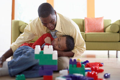 Father and Son playing with Legos