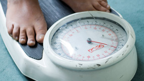 Your weight (Feet on a weighing scales)