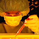 Scientist in lab (PhotoDisc)