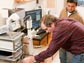 Photo of researchers Bret Flanders and Prem Thapa in their laboratory at Kansas State University.