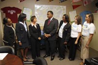 Celebrating the ribbon cutting for the ‘Go Center’ at Hampton Preparatory are Lisa Spears, Uplift senior academic counselor; Laura Cobb, Uplift’s chief of schools; Deardra Hayes-Whigham, Hampton Preparatory senior director; John Ellis Price, UNT Dallas vice chancellor; and G-Force mentors Sharon Dickens, Bianca Mendez, Karen Wright and Yael Portley.