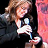 Sarah Palin referring to prompts written on her hand during a Q&A at tea party movement convention