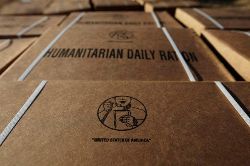 Date: 01/23/2010 Description: Boxes of food rations are stacked at a refugee camp in Port-au-Prince, Haiti. © AP Image