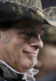 ARLINGTON, TX - JANUARY 9:  Musician Ted Nugent reacts before playing the national anthem for the 2010 NFC wild-card playoff game between the Dallas Cowboys and the Philadelphia Eagles at Cowboys Stadium on January 9, 2010 in Arlington, Texas.