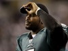 ARLINGTON, TX - JANUARY 9:  Michael Vick #7 of the Philadelphia Eagles looks on from the sideline in the second quarter against the Dallas Cowboys during the 2010 NFC wild-card playoff game at Cowboys Stadium on January 9, 2010 in Arlington, Texas.