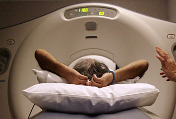 A patient undergoes CT scan testing at Southwest Imaging Center in Dallas. (Mona Reeder/The Dallas Morning News)