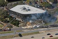 Smoke billows from a seven-story office building in Austin, Texas after a small private plane crashed into it. The building houses an Internal Revenue Service office. Several people were injured.