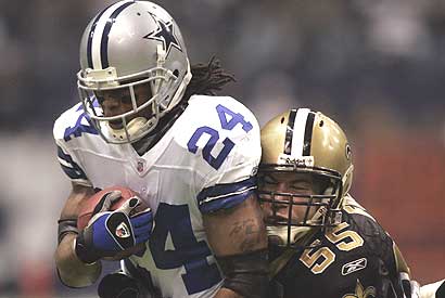 Marion Barber runs against the Saints in a game from the 2006 season. A strong Cowboys running attack is a necessity to win Saturday.