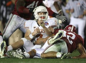 A blind-side hit by Alabama's Eryk Anders popped the ball from Garrett Gilbert's grasp with 3:02 left in the fourth quarter. The Crimson Tide scored moments later.