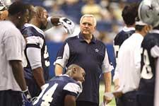 Even with a 9-7 season, Wade Phillps (center) and the Dallas Cowboys aren't assured of a playoff spot in the NFC.