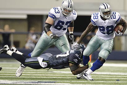 Kyle Kosier (63) is part of an offensive line that has helped the Dallas Cowboys average 147.5 yards rushing per game.